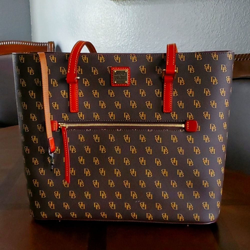 Dooney & Bourke Handbag New never used 12h x 15wx 3 color Brn Leather w/red inte